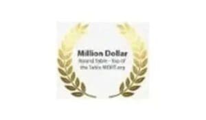 A gold laurel wreath with the words " million dollar round table-top of the tables next. Org."